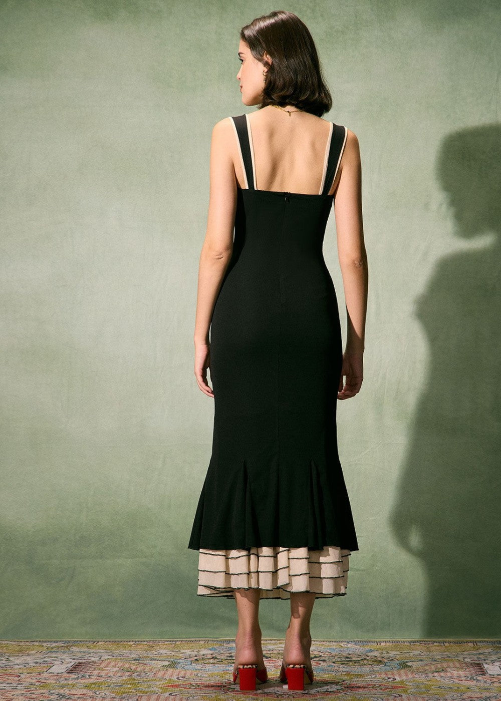 Tight black long dress with sweetheart neckline and thin straps